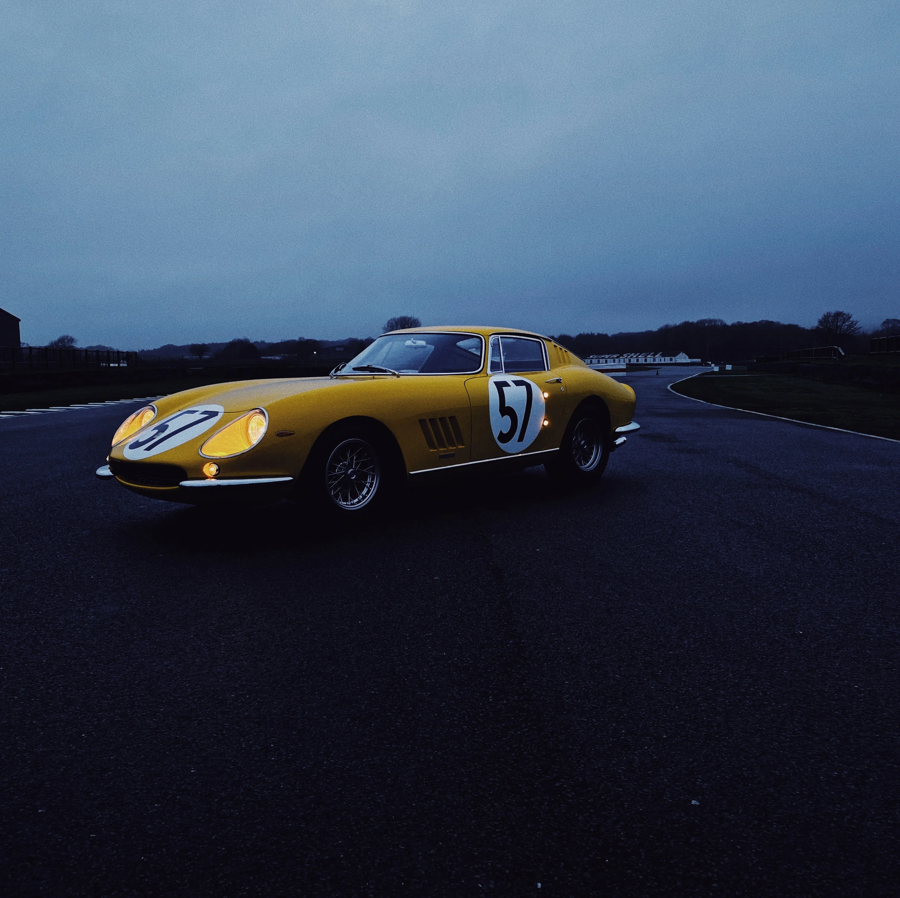 Ferrari 275 GTB at dusk on track