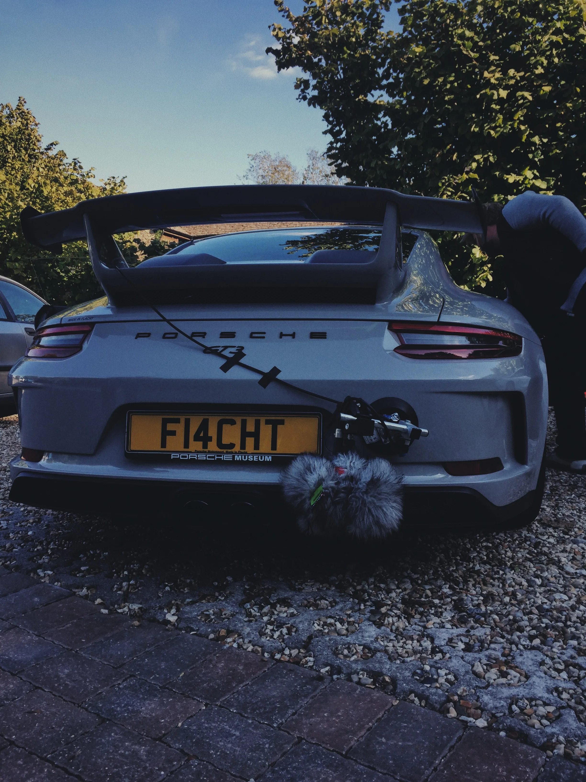 Microphone rig on a Porsche GT3